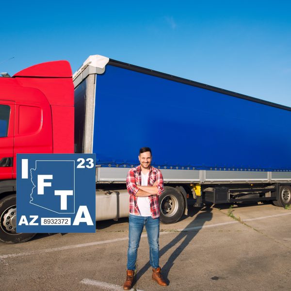 portrait-professional-american-truck-driver-casual-clothing-boots-standing-front-truck-vehicle-with-long-trailer